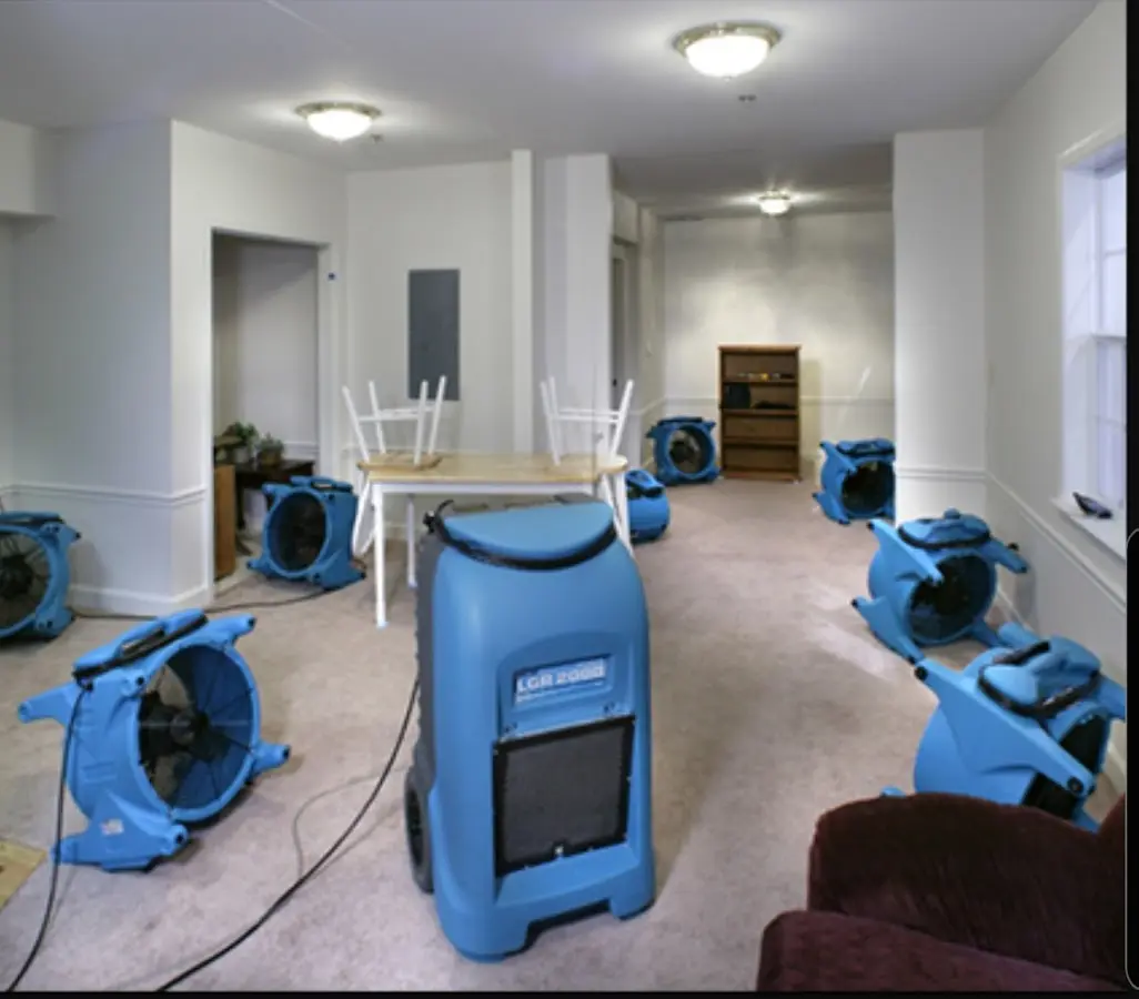 Air movers and dehumidifier setup for Water Damage Restoration in West Salem