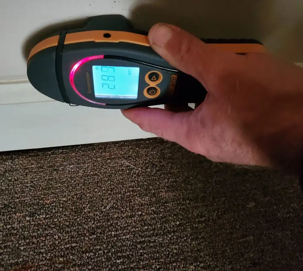 Moisture detection at baseboard during Sewage Cleanup & Sanitation in West Salem